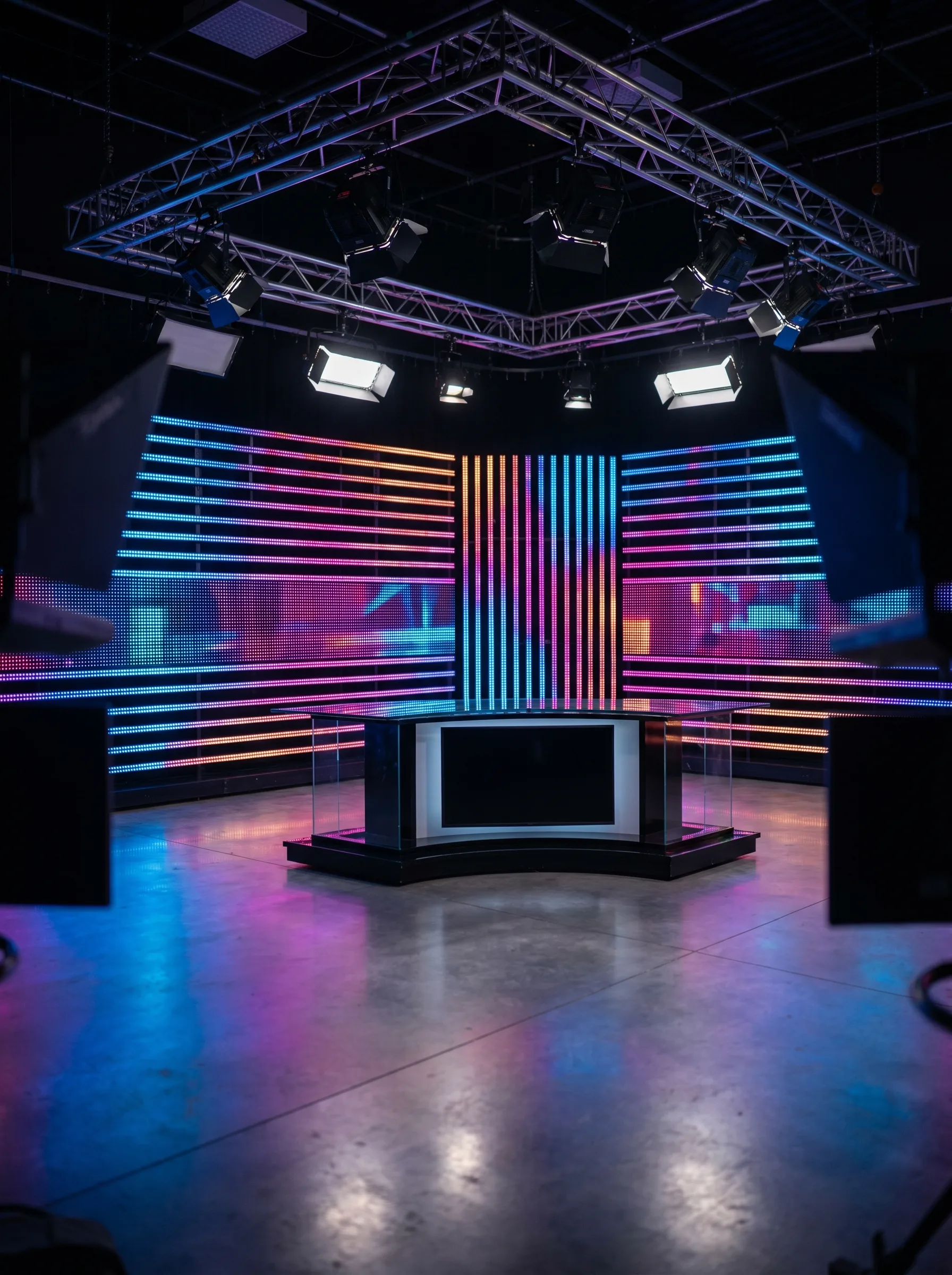 PILEDS pixel bar backdrop inside a broadcast TV studio